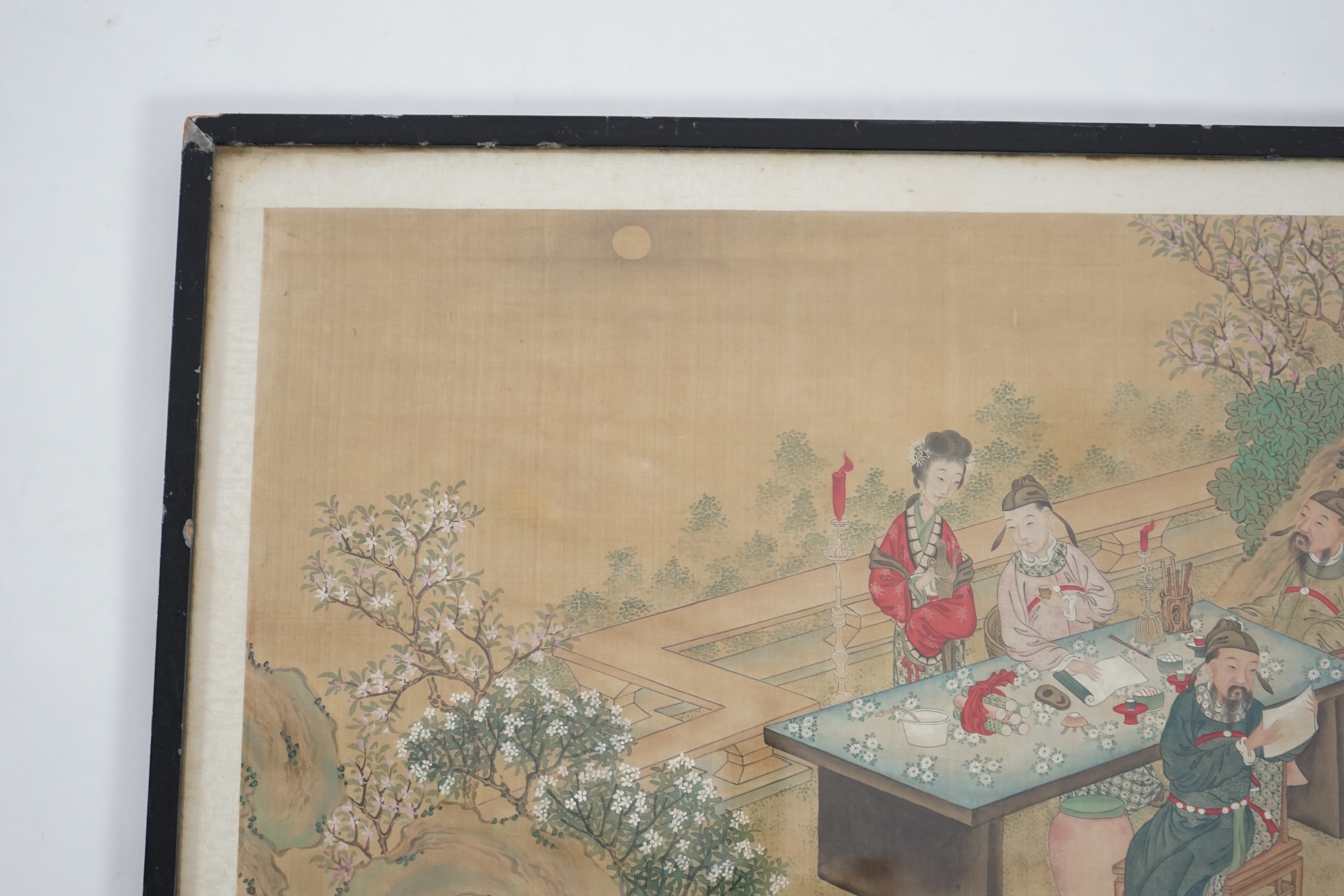 Chinese School, late 19th century, painting on silk, Scholars and attendants in a garden, 35cm x 58cm, framed and glazed. Condition - fair, some general discolouration